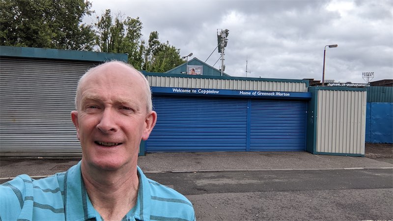 Self portait in front of the entrance gates at the Greenock Morton Football Club ground