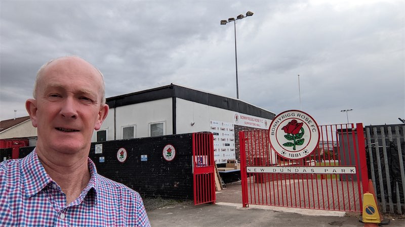 Self portait photo in front of the entrance gates at the Bonnyrigg Rose Football Club ground